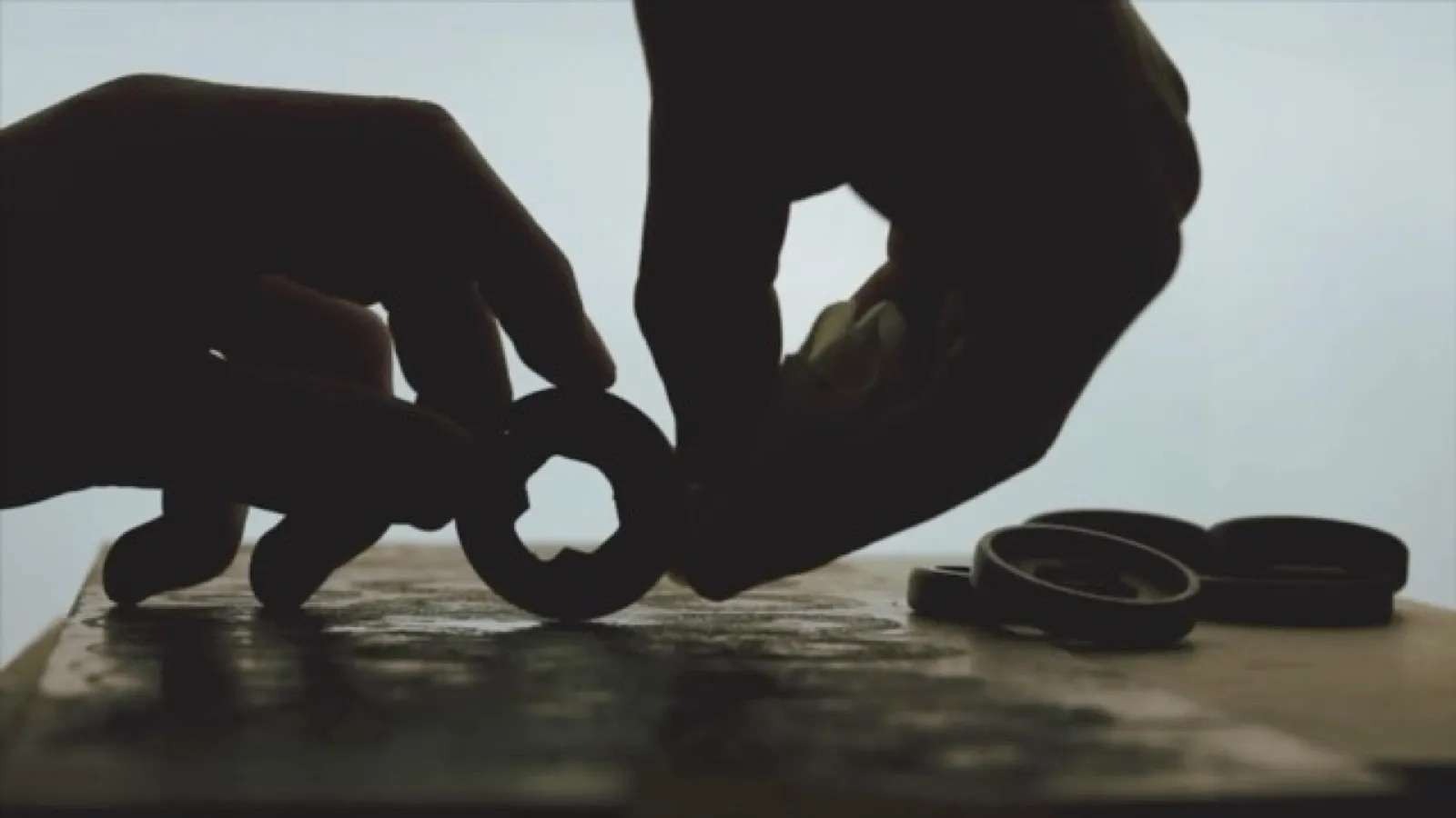 A wooden watch case being shaped by hand at the Muizenberg workbench